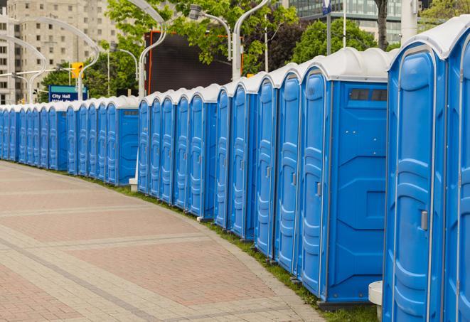 a row of portable restrooms at a fairground, offering visitors a clean and hassle-free experience in newcastle